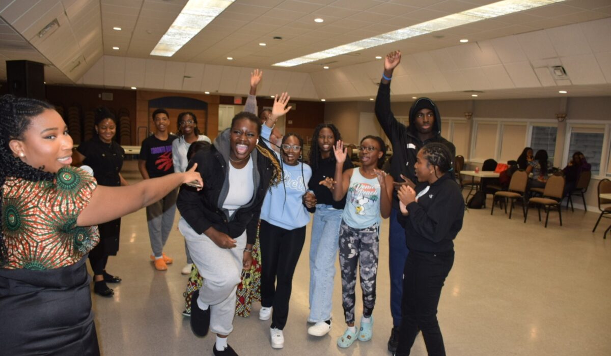 CEO cheering on guests